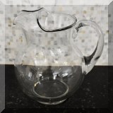 G19. Glass pitcher 9”h x 5”w 